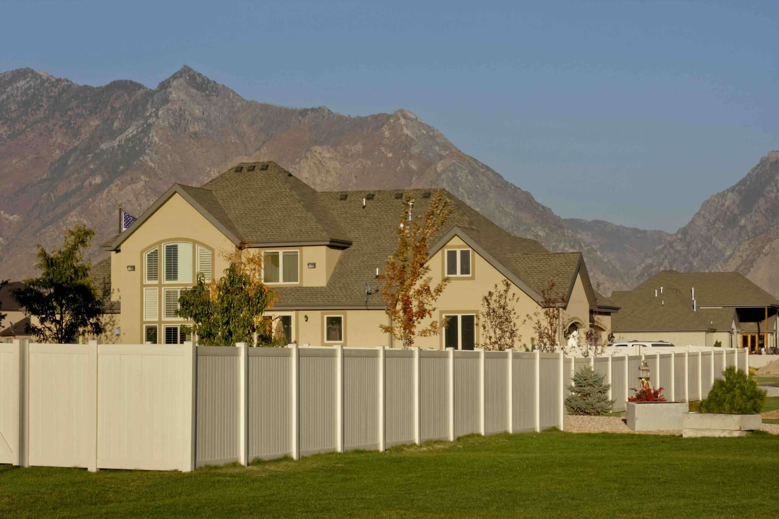 vinyl privacy fence in front of utah mountains